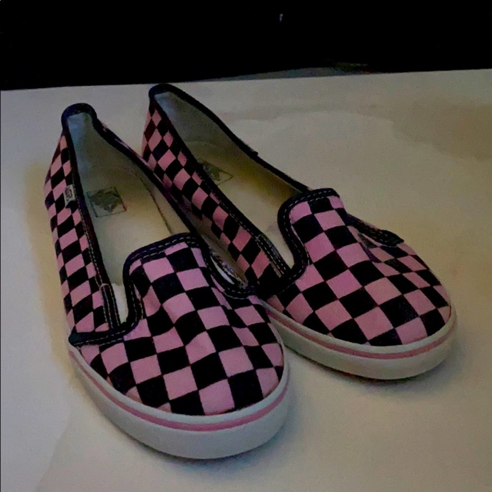 pink and black checkered pattern slip on vans